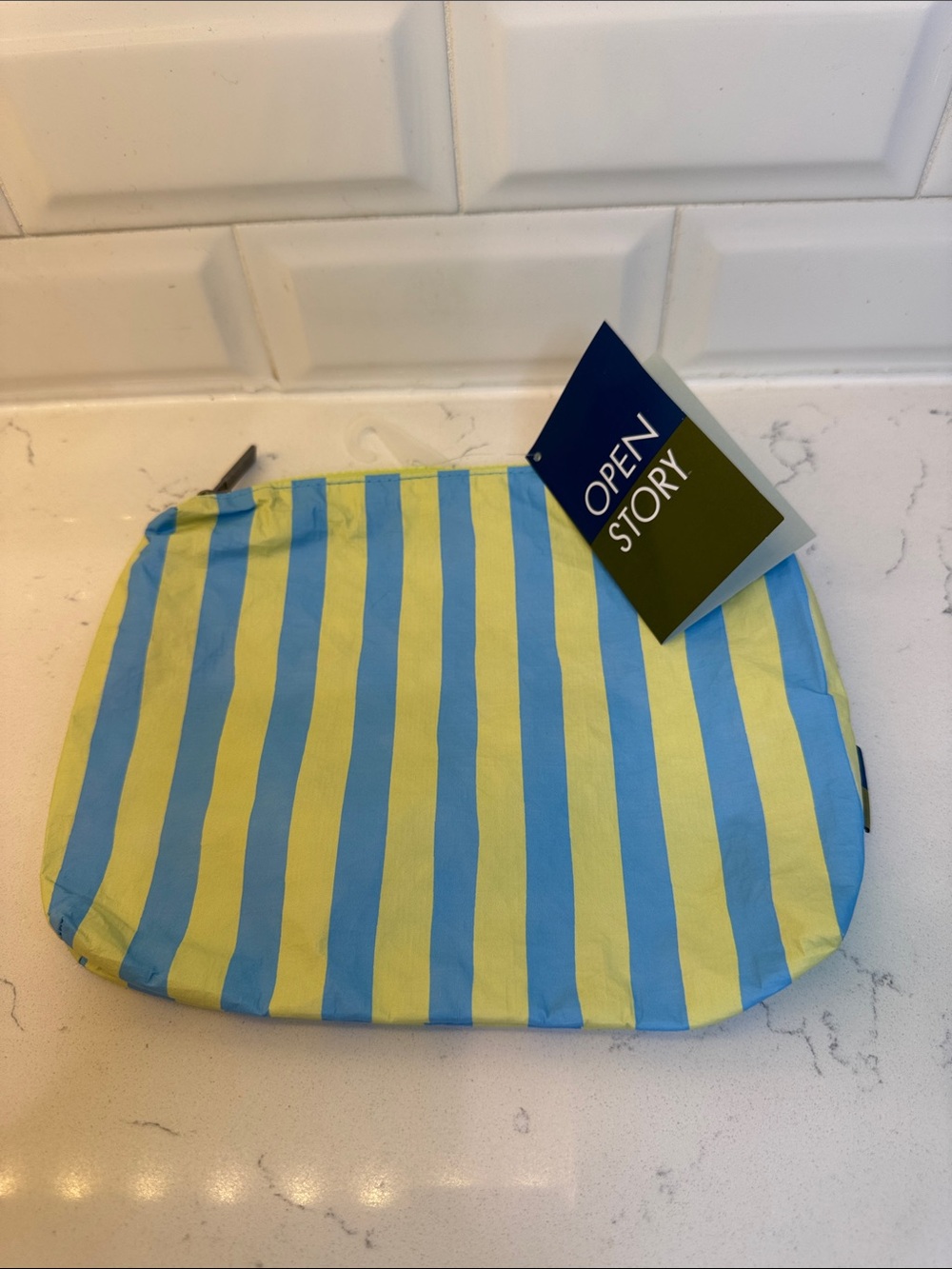 Open Story Water-Resistant Reversible Pouch